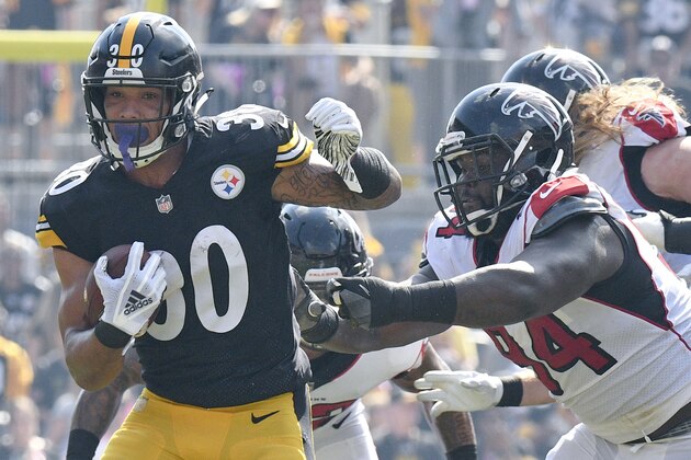 Pittsburgh Steelers running back James Conner (30) runs against the Atlanta Falcons in the first quarter an NFL football game against the Atlanta Falcons, Sunday, Oct. 7, 2018, in Pittsburgh. (AP Photo/Don Wright)