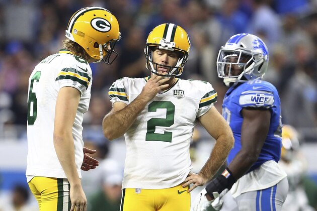 Place holder JK Scott (6) talks to kicker Mason Crosby after Crosby missed his third field goal during the second half of an NFL football game against the Detroit Lions, Sunday, Oct. 7, 2018, in Detroit. (AP Photo/Rey Del Rio)