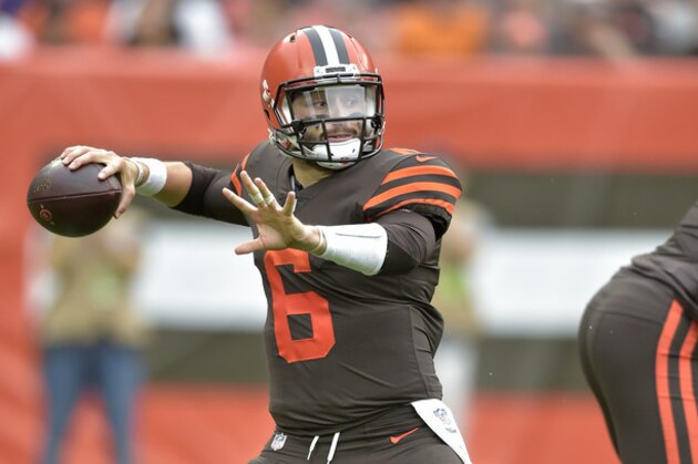 Cleveland Browns quarterback Baker Mayfield looks to throw during the first half of an NFL football game against the Baltimore Ravens, Sunday, Oct. 7, 2018, in Cleveland. (AP Photo/David Richard)