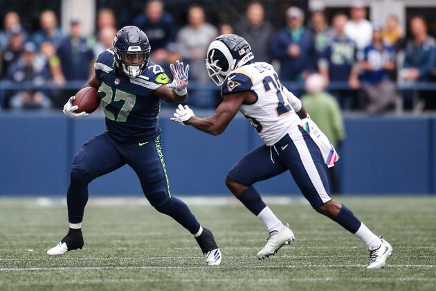 SEATTLE, WA - OCTOBER 07: Running Back Mike Davis #27 of the Seattle Seahawks runs the ball in the first half against the Los Angeles Rams at CenturyLink Field on October 7, 2018 in Seattle, Washington. (Photo by Otto Greule Jr/Getty Images)
