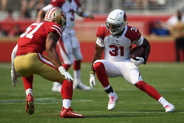 SANTA CLARA, CA - OCTOBER 07: David Johnson #31 of the Arizona Cardinals rushes with the ball against the San Francisco 49ers during their NFL game at Levi's Stadium on October 7, 2018 in Santa Clara, California. (Photo by Thearon W. Henderson/Getty Images)