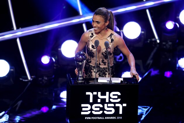 LONDON, ENGLAND - SEPTEMBER 24:  Marta of Orlando Pride receives the trophy for The Best FIFA Women's Player 2018 during the The Best FIFA Football Awards Show at Royal Festival Hall on September 24, 2018 in London, England.  (Photo by Dan Istitene/Getty Images)