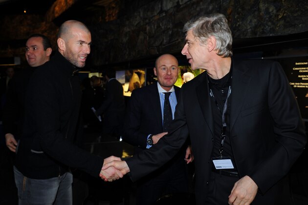 GENEVA - JANUARY 20:  Former footballer Zinedine Zidane greets the current Arsenal manager Arsene Wenger while Georges Kern, CEO of IWC Schaffhausen, looks on during a visit of the IWC Schaffhausen booth during the Salon International de la Haute Horlogerie at Geneva Palexpo on January 20, 2009 in Geneva, Switzerland.  (Photo by Pascal Le Segretain/Getty Images for IWC Schaffhausen)