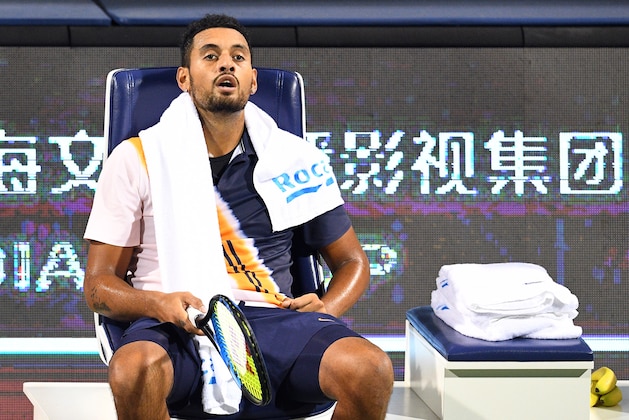 Nick Kyrgios of Australia reacts after being defeated by Bradley Klahn of the US during their men's single round of 64 match at the Shanghai Masters tennis tournament on October 8, 2018. (Photo by Johannes EISELE / AFP)        (Photo credit should read JOHANNES EISELE/AFP/Getty Images)