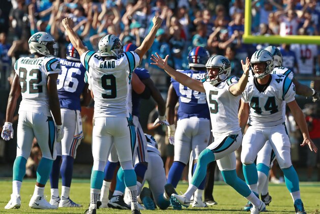 Carolina Panthers' Graham Gano (9) celebrates his game-winning field goal against the New York Giants with Michael Palardy (5) in the second half of an NFL football game in Charlotte, N.C., Sunday, Oct. 7, 2018. (AP Photo/Jason E. Miczek)