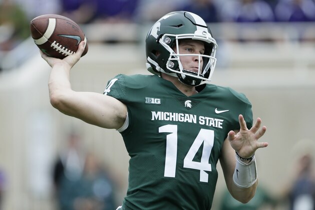EAST LANSING, MI - OCTOBER 6: Quarterback Brian Lewerke #14 of the Michigan State Spartans passes against the Northwestern Wildcats during the first half at Spartan Stadium on October 6, 2018 in East Lansing, Michigan. (Photo by Duane Burleson/Getty Images)