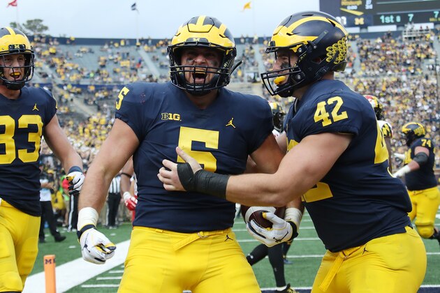 ANN ARBOR, MI - OCTOBER 06: Jarred Wangler #5 of the Michigan Wolverines celebrates a second half touchdown while playing the Maryland Terrapins on October 6, 2018 at Michigan Stadium in Ann Arbor, Michigan. (Photo by Gregory Shamus/Getty Images)