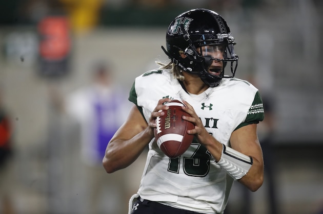 Hawaii Warriors quarterback Cole McDonald (13) in the second half of an NCAA college football game Saturday, Aug. 25, 2018, in Fort Collins, Colo. Hawaii won 43-34. (AP Photo/David Zalubowski) Hawaii Warriors quarterback Cole McDonald (13) in the second half of an NCAA college football game Saturday, Aug. 25, 2018, in Fort Collins, Colo. Hawaii won 43-34. (AP Photo/David Zalubowski)