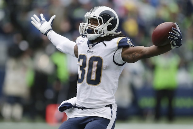 Los Angeles Rams running back Todd Gurley celebrates after scoring a touchdown during the second half of an NFL football game against the Seattle Seahawks, Sunday, Oct. 7, 2018, in Seattle. (AP Photo/Scott Eklund)