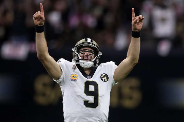 NEW ORLEANS, LA - OCTOBER 08:  Drew Brees #9 of the New Orleans Saints reacts after throwing a 62 yard pass to take the all time yardage record against the Washington Redskins at Mercedes-Benz Superdome on October 8, 2018 in New Orleans, Louisiana.  (Photo by Chris Graythen/Getty Images)