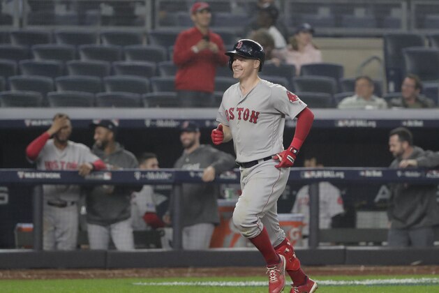 Boston Red Sox's Brock Holt reacts as he rounds the bases after hitting a two-run home run against the New York Yankees during the ninth inning of Game 3 of baseball's American League Division Series, Monday, Oct. 8, 2018, in New York. (AP Photo/Frank Franklin II)