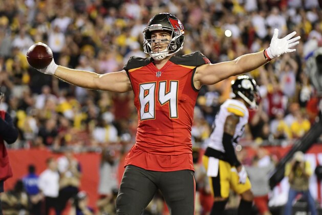 TAMPA, FL - SEPTEMBER 24:  Cameron Brate #84 of the Tampa Bay Buccaneers reacts after scoring in the first quarter against the Pittsburgh Steelers on September 24, 2018 at Raymond James Stadium in Tampa, Florida. (Photo by Julio Aguilar/Getty Images)