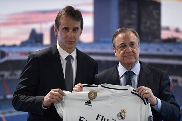 Real Madrid´s newly appointed coach Julen Lopetegui (L) poses with Real Madrid's president Florentino Perez during his official presentation at the Santiago Bernabeu stadium in Madrid on June 14, 2018. - Just a day after he was sacked on the eve of the World Cup, former Spain coach Julen Lopetegui arrived in Madrid to be officially presented as Real Madrid's new manager. (Photo by OSCAR DEL POZO / AFP)        (Photo credit should read OSCAR DEL POZO/AFP/Getty Images)