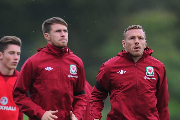 CARDIFF, WALES - OCTOBER 14:  Wales players Craig Bellamy (r) Aaron Ramsey (2nd right) and Harry Wilson (3rd right) in action during Wales training ahead of their World Cup qualifier against Belguim tomorrow night at the Vale Complex on October 14, 2013 in Cardiff, Wales.  (Photo by Stu Forster/Getty Images)