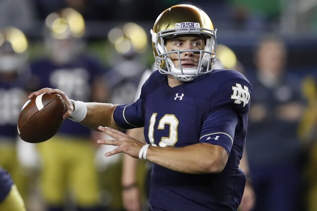 Notre Dame quarterback Ian Book throws during the second half of an NCAA college football game against Stanford, Saturday, Sept. 29, 2018, in South Bend, Ind. (AP Photo/Carlos Osorio)