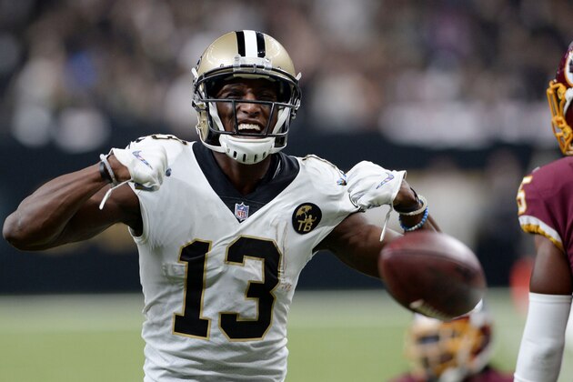 New Orleans Saints wide receiver Michael Thomas (13) reacts after a completion in the first half of an NFL football game against the Washington Redskins in New Orleans, Monday, Oct. 8, 2018. The Saints won 43-19. (AP Photo/Bill Feig)