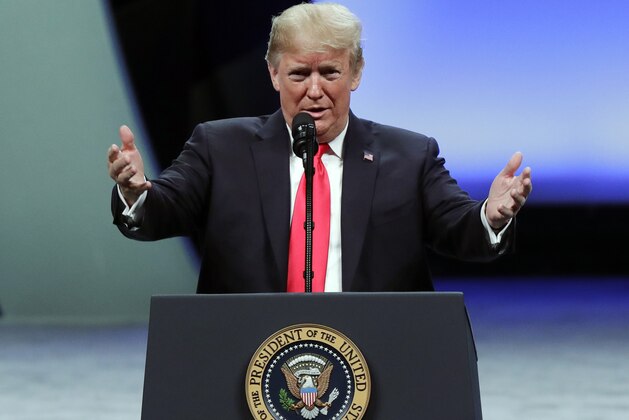 President Donald Trump addresses the International Association of Chiefs of Police at their annual convention Monday, Oct. 8, 2018, in Orlando, Fla. (AP Photo/John Raoux)