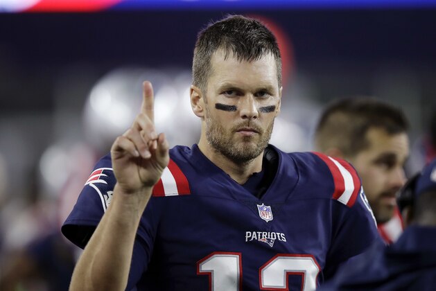 New England Patriots quarterback Tom Brady signals on the sideline during the first half of an NFL football game against the Indianapolis Colts, Thursday, Oct. 4, 2018, in Foxborough, Mass. (AP Photo/Charles Krupa)