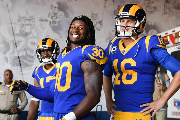 LOS ANGELES, CA - SEPTEMBER 27: Running back Todd Gurley #30 and quarterback Jared Goff #16 of the Los Angeles Rams enter the stadium through the tunnel area of their game against the Minnesota Vikings at Los Angeles Memorial Coliseum on September 27, 2018 in Los Angeles, California. (Photo by Harry How/Getty Images)