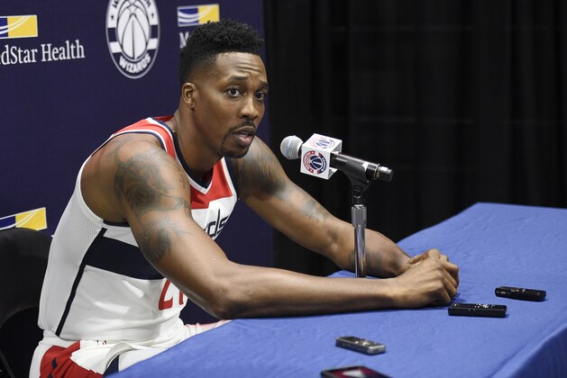 Washington Wizards' Dwight Howard speaks to the media during an NBA basketball media day, Monday, Sept. 24, 2018, in Washington. Howard could miss start of Wizards camp with bad back. (AP Photo/Nick Wass) Washington Wizards' Dwight Howard speaks to the media during an NBA basketball media day, Monday, Sept. 24, 2018, in Washington. Howard could miss start of Wizards camp with bad back. (AP Photo/Nick Wass)