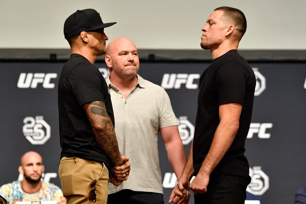 LOS ANGELES, CA - AUGUST 03:  (L-R) Opponents Dustin Poirier and Nate Diaz face off during the UFC press conference inside the Orpheum Theater on August 3, 2018 in Los Angeles, California. (Photo by Jeff Bottari/Zuffa LLC/Zuffa LLC via Getty Images)