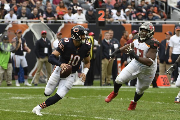 Chicago Bears quarterback Mitchell Trubisky (10) looks for a receiver during the first half of an NFL football game against the Tampa Bay Buccaneers Sunday, Sept. 30, 2018, in Chicago. (AP Photo/David Banks)