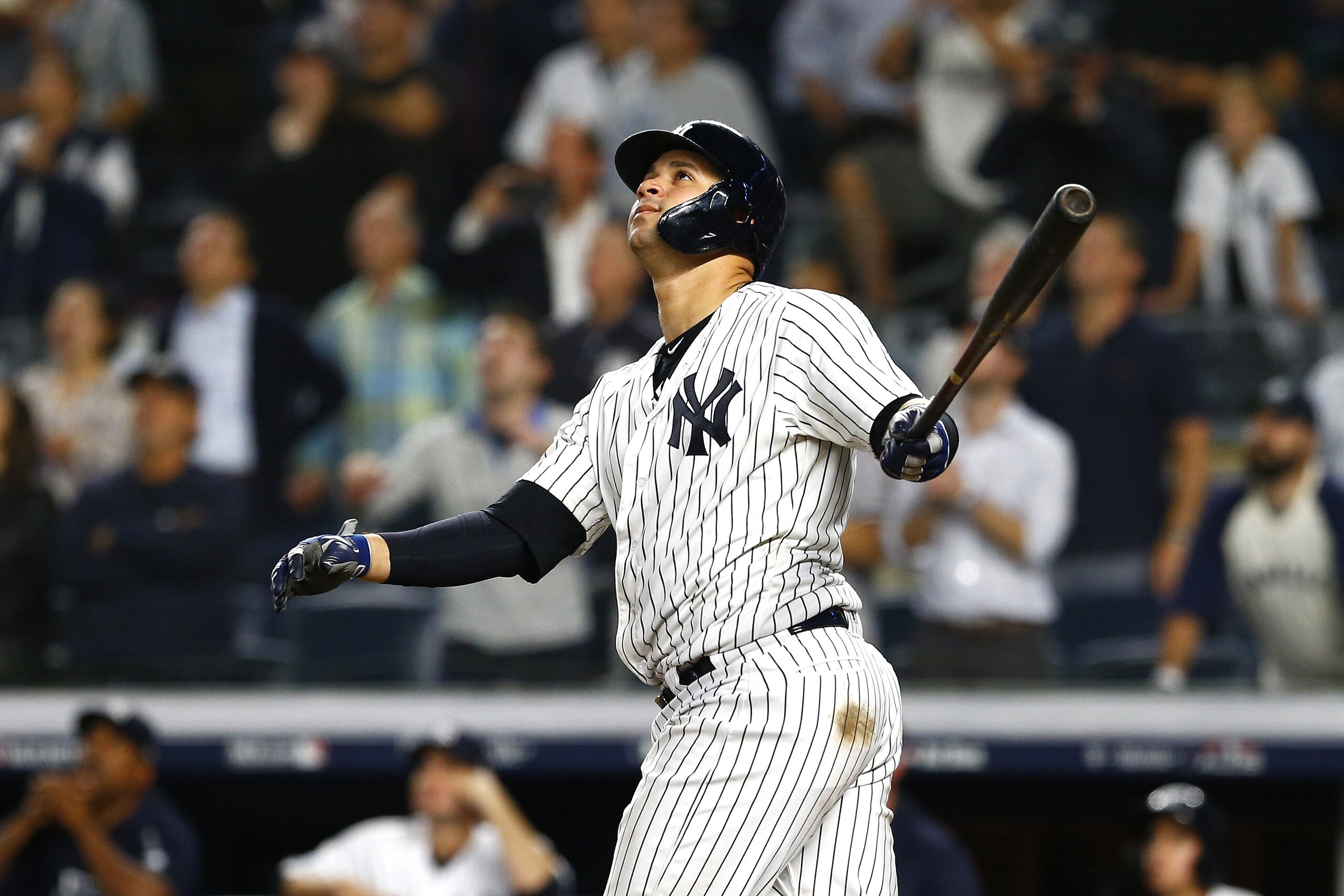 NEW YORK, NEW YORK - OCTOBER 09:  Gary Sanchez #24 of the New York Yankees hits a sac fly to score Didi Gregorius #18 against Craig Kimbrel #46 of the Boston Red Sox during the ninth inning in Game Four of the American League Division Series at Yankee Stadium on October 09, 2018 in the Bronx borough of New York City. (Photo by Mike Stobe/Getty Images)