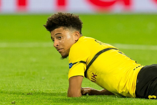 DORTMUND, GERMANY - OCTOBER 03: Jadon Sancho of Borussia Dortmund on the ground during the Group A match of the UEFA Champions League between Borussia Dortmund and AS Monaco at Signal Iduna Park on October 3, 2018 in Dortmund, Germany. (Photo by TF-Images/TF-Images via Getty Images)