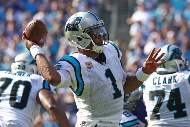 Carolina Panthers' Cam Newton (1) looks to pass against the New York Giants in the second half of an NFL football game in Charlotte, N.C., Sunday, Oct. 7, 2018. (AP Photo/Jason E. Miczek)