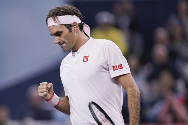 SHANGHAI, CHINA - OCTOBER 10:       Roger Federer of Switzerland reacts against Daniil Medvedev of Russia during second round of the 2018 Rolex Shanghai Masters on Day 4 at Qi Zhong Tennis Centre on October 10, 2018 in Shanghai, China. (Photo by Fred Lee/Getty Images)