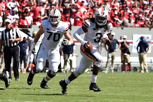 RALEIGH, NC - SEPTEMBER 29: Bryce Perkins #3 of the Virginia Cavaliers runs with the ball against the North Carolina State Wolfpack at Carter-Finley Stadium on September 29, 2018 in Raleigh, North Carolina. NC State won 35-21. (Photo by Lance King/Getty Images)