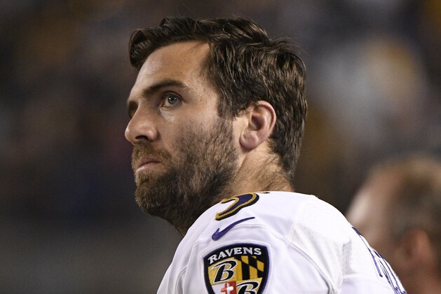 Baltimore Ravens quarterback Joe Flacco (5) stands during the National Anthem before an NFL football game against the Pittsburgh Steelers in Pittsburgh, Sunday, Sept. 30, 2018. (AP Photo/Don Wright)