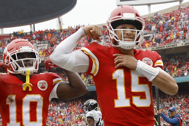 Kansas City Chiefs quarterback Patrick Mahomes (15) celebrates a touchdown during the first half of an NFL football game against the Jacksonville Jaguars in Kansas City, Mo., Sunday, Oct. 7, 2018. (AP Photo/Charlie Riedel)