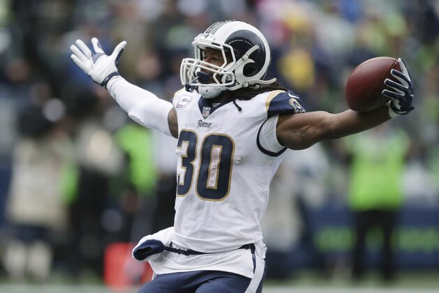 Los Angeles Rams running back Todd Gurley celebrates after scoring a touchdown during the second half of an NFL football game against the Seattle Seahawks, Sunday, Oct. 7, 2018, in Seattle. (AP Photo/Scott Eklund)