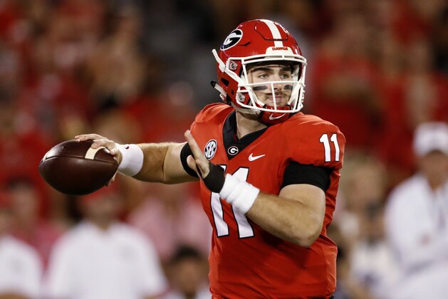 Georgia quarterback Jake Fromm prepares to throw a pass during the first half of the team's NCAA college football game against Vanderbilt on Saturday, Oct. 6, 2018, in Atlanta. (AP Photo/John Bazemore)