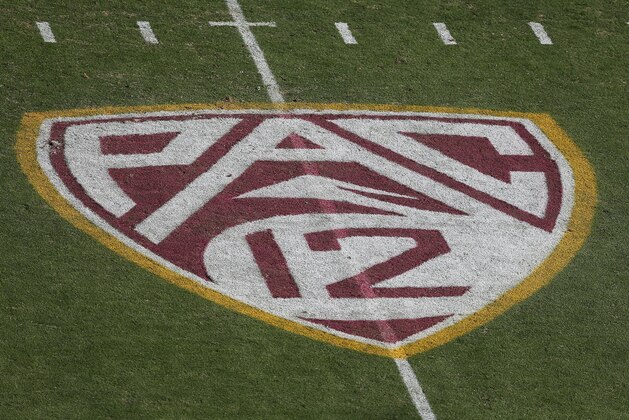 TEMPE, AZ - OCTOBER 19:  The 'Pac 12' logo is displayed on the filed during the college football game between the Washington Huskies and the Arizona State Sun Devils at Sun Devil Stadium on October 19, 2013 in Tempe, Arizona.  The Sun Devils defeated the Huskies 53-24.  (Photo by Christian Petersen/Getty Images)