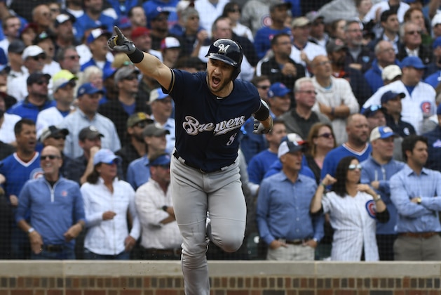 Milwaukee Brewers' Ryan Braun (8) reacts after he hit an RBI single during the eighth inning of a tie break baseball game against the Chicago Cubs on Monday, Oct. 1, 2018, in Chicago. (AP Photo/Matt Marton)