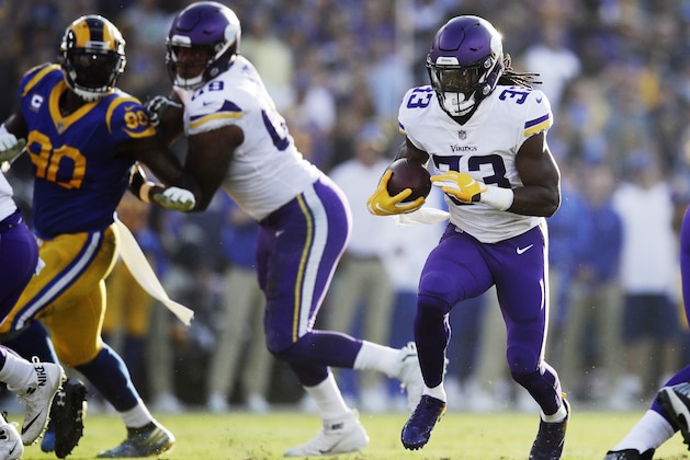 FILE - In this Thursday, Sept. 27, 2018, file photo, Minnesota Vikings running back Dalvin Cook carries the ball during an NFL football game against the Los Angeles Rams in Los Angeles. Minnesota must find a running game, ranking dead last. If Dalvin Cook can get healthy,  it would be a huge help. (AP Photo/Jae C. Hong, File)