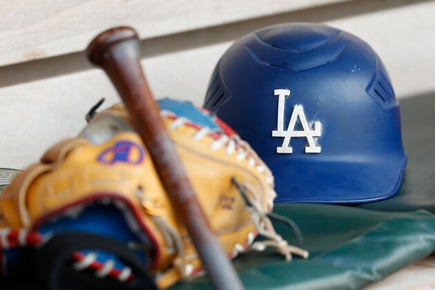 OAKLAND, CA - AUGUST 07: A batting helmet sits in the Los Angeles Dodgers dugout before the game against the Oakland Athletics at Oakland Alameda Coliseum on August 7, 2018 in Oakland, California. (Photo by Lachlan Cunningham/Getty Images)