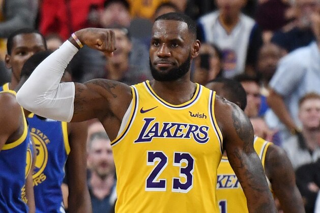 LAS VEGAS, NEVADA - OCTOBER 10:  LeBron James #23 of the Los Angeles Lakers celebrates after he made a shot against the Golden State Warriors and was fouled during their preseason game at T-Mobile Arena on October 10, 2018 in Las Vegas, Nevada. The Lakers defeated the Warriors 123-113. NOTE TO USER: User expressly acknowledges and agrees that, by downloading and or using this photograph, User is consenting to the terms and conditions of the Getty Images License Agreement.  (Photo by Ethan Miller/Getty Images)
