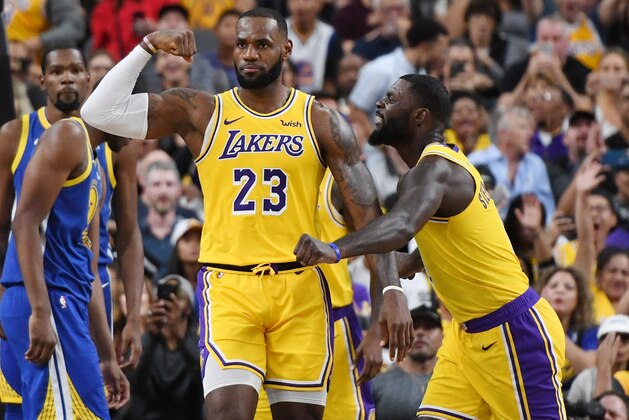 LAS VEGAS, NEVADA - OCTOBER 10:  LeBron James #23 and Lance Stephenson #6 of the Los Angeles Lakers celebrate after James made a shot against the Golden State Warriors and was fouled during their preseason game at T-Mobile Arena on October 10, 2018 in Las Vegas, Nevada. The Lakers defeated the Warriors 123-113. NOTE TO USER: User expressly acknowledges and agrees that, by downloading and or using this photograph, User is consenting to the terms and conditions of the Getty Images License Agreement.  (Photo by Ethan Miller/Getty Images)