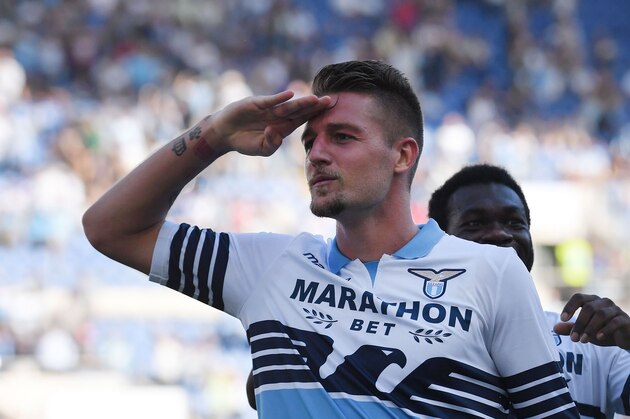 Lazio's Serbian midfielder Sergej Milinkovic-Savic   celebrates after scoring a goal  during the Italian Serie A football match between SS Lazio and Genoa CFC at the Olympic Stadium in Rome on September 23, 2018. (Photo by Tiziana FABI / AFP)        (Photo credit should read TIZIANA FABI/AFP/Getty Images)