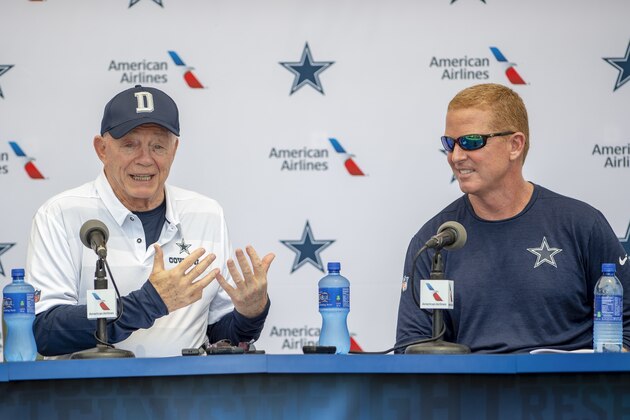 Dallas Cowboys owner Jerry Jones, left and head coach Jason Garrett take questions during the
