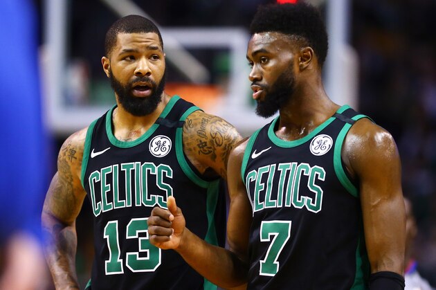 BOSTON, MA - MARCH 31:  Marcus Morris #13 and Jaylen Brown #7 of the Boston Celtics look on during a game against the Toronto Raptors at TD Garden on March 31, 2018 in Boston, Massachusetts. NOTE TO USER: User expressly acknowledges and agrees that, by downloading and or using this photograph, User is consenting to the terms and conditions of the Getty Images License Agreement. (Photo by Adam Glanzman/Getty Images)