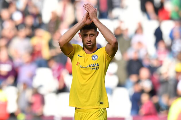 Chelsea's English defender Gary Cahill applauds supporters after the English Premier League football match between West Ham United and Chelsea at The London Stadium, in east London on September 23, 2018. - The game finished 0-0. (Photo by Ben STANSALL / AFP) / RESTRICTED TO EDITORIAL USE. No use with unauthorized audio, video, data, fixture lists, club/league logos or 'live' services. Online in-match use limited to 120 images. An additional 40 images may be used in extra time. No video emulation. Social media in-match use limited to 120 images. An additional 40 images may be used in extra time. No use in betting publications, games or single club/league/player publications. /         (Photo credit should read BEN STANSALL/AFP/Getty Images)