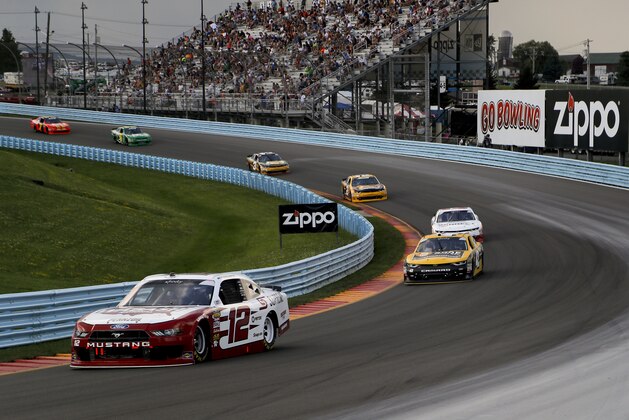 Brad Keselowski (12) comes out of Turn 2 during a NASCAR series auto race, Saturday, Aug. 4, 2018, in Watkins Glen, N.Y. (AP Photo/Julie Jacobson)