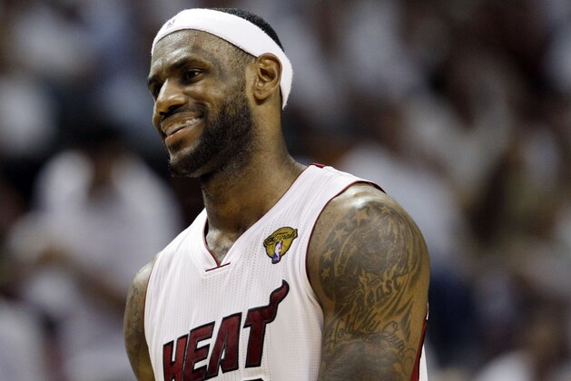 Miami Heat's LeBron James reacts during the second half of Game 6 of the NBA Finals basketball game against the Dallas Mavericks Sunday, June 12, 2011, in Miami. (AP Photo/David J. Phillip)
