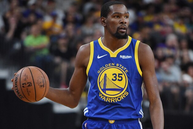 LAS VEGAS, NEVADA - OCTOBER 10:  Kevin Durant #35 of the Golden State Warriors brings the ball up the court against the Los Angeles Lakers during their preseason game at T-Mobile Arena on October 10, 2018 in Las Vegas, Nevada. The Lakers defeated the Warriors 123-113. NOTE TO USER: User expressly acknowledges and agrees that, by downloading and or using this photograph, User is consenting to the terms and conditions of the Getty Images License Agreement.  (Photo by Ethan Miller/Getty Images)