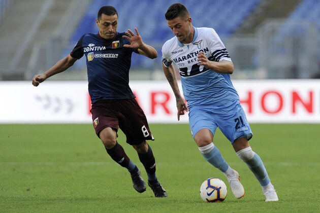 ROME, ITALY - SEPTEMBER 23:  Romulo Souza of Genoa CFC compete for the ball with Sergej Milinkovic Savic of SS Lazio during the serie A match between SS Lazio and Genoa CFC at Stadio Olimpico on September 23, 2018 in Rome, Italy.  (Photo by Marco Rosi/Getty Images)