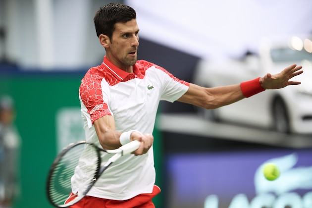 SHANGHAI, CHINA - OCTOBER 13:  Novak Djokovic of Serbia hits a return against Alexander Zverev of Germany  during their Singles - Semifinals match of the 2018 Rolex Shanghai Masters at Qi Zhong Tennis Centre on October 13, 2018 in Shanghai, China.  (Photo by Lintao Zhang/Getty Images)